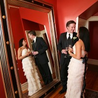 Bride and Groom reflected in a mirror